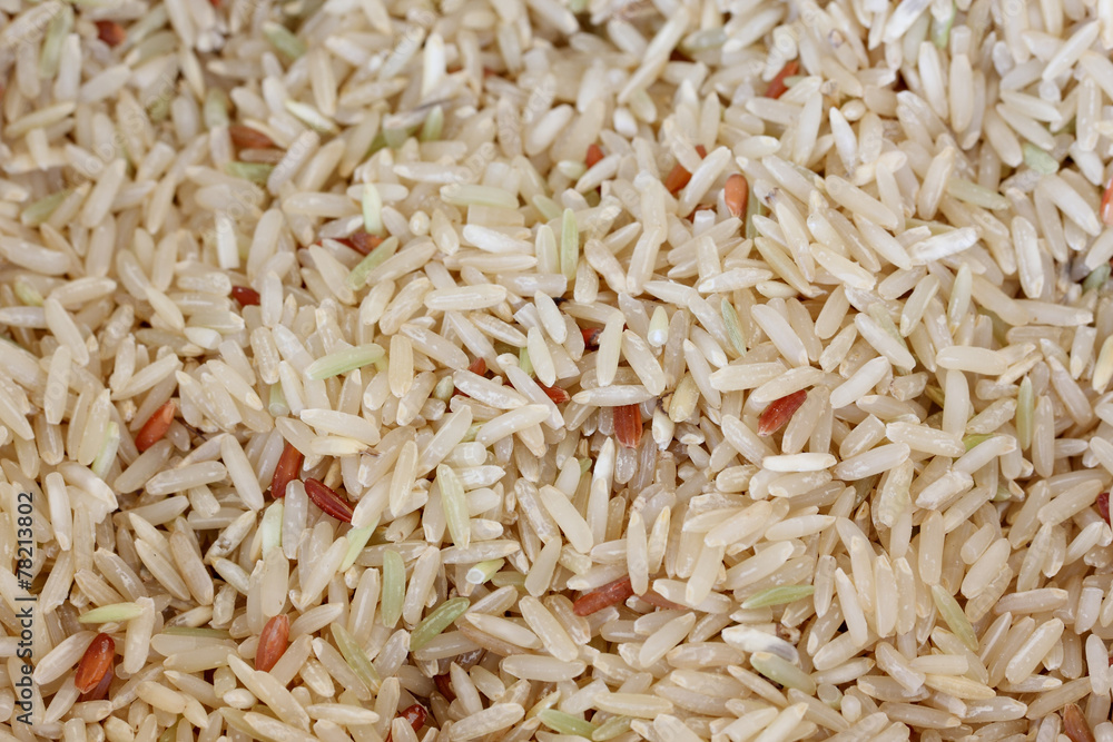 coarse rice or half polished rice background, uncooked raw cerea