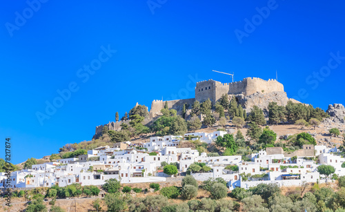 The ancient Acropolis of Lindos and the modern city. Rhodes Isla
