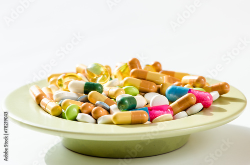 pills on plate isolated
