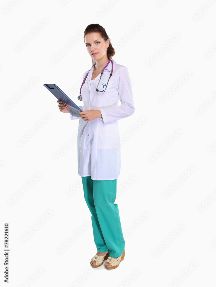 Smiling female doctor with a folder in uniform standing at Smiling female doctor with a folder in uniform standing at