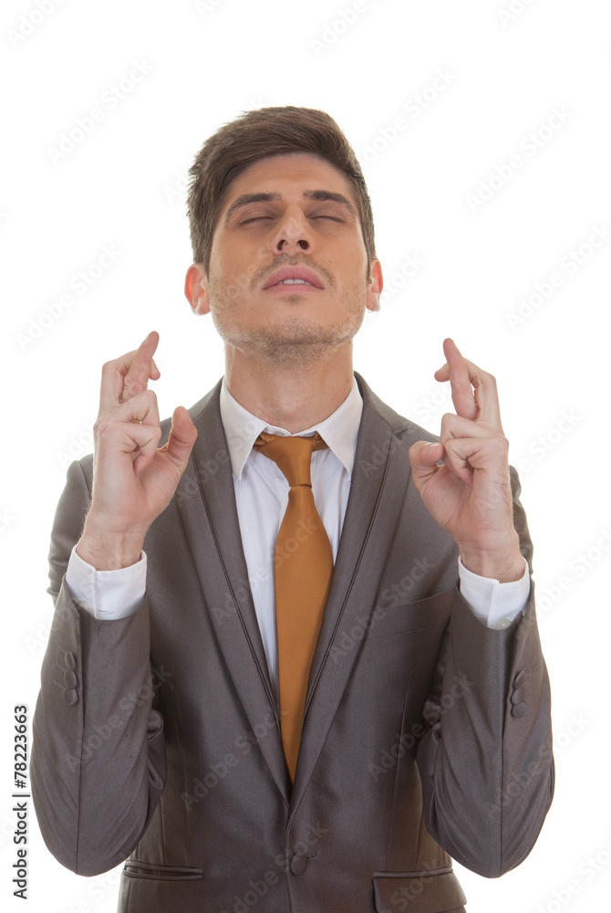 business man fingers crossed eyes closed business man fingers crossed eyes closed