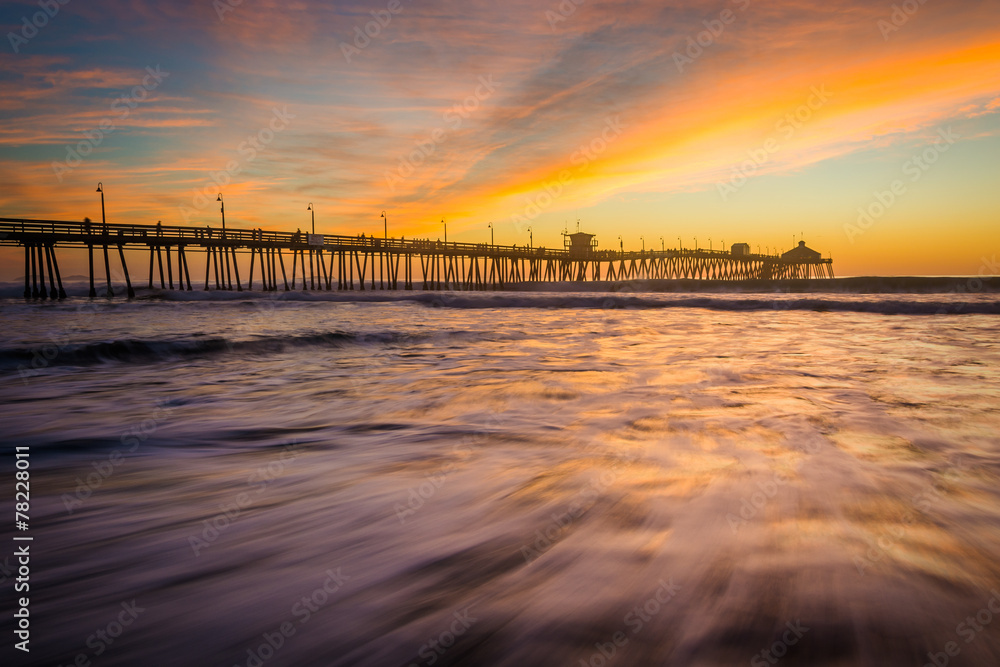 Waves in the Pacific Ocean and the fishing pier at sunset, in Im
