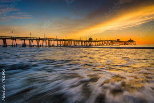 Waves in the Pacific Ocean and the fishing pier at sunset  in Im