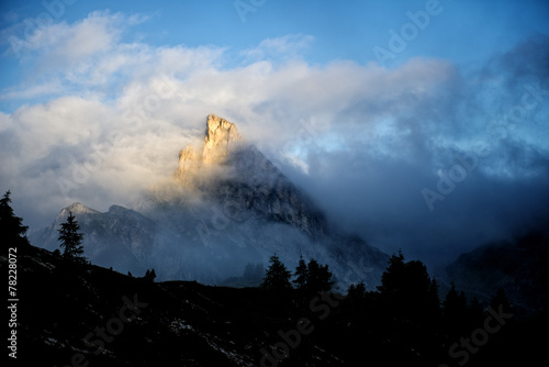 Fotografie Mount Sass de Stria at sunrise in the clouds, Dolomites, Italy