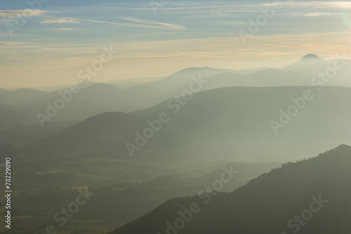 Sunrise on Apennines with fog, blue sky with clouds, Marche, Ita