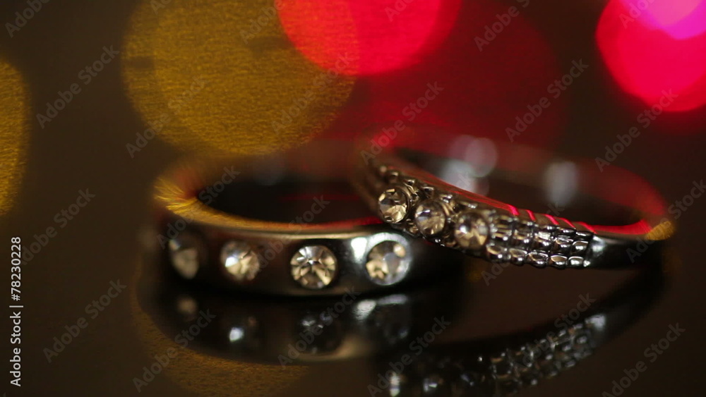 Wedding rings on a colorful flashing background Wedding rings on a colorful flashing background