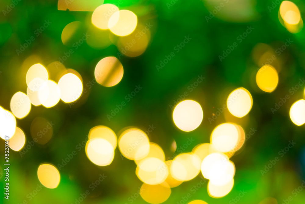 Colorful Glitter light from Christmas lighting background abstra