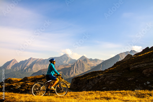 Cyclist woman in hight mountais