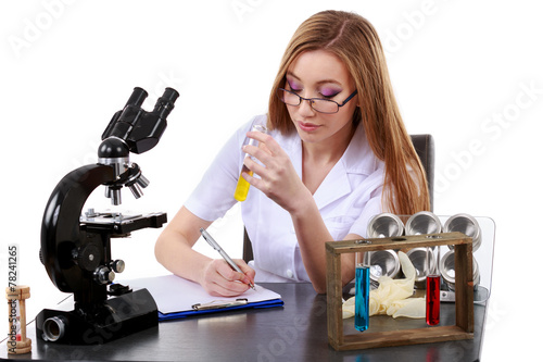 beautiful woman scientist in the lab perform various operations