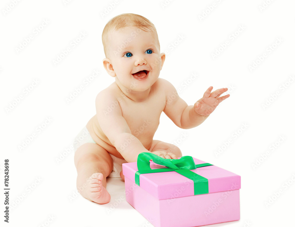 Sweet baby and gift on a white background Sweet baby and gift on a white background