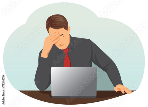Overworked businessman is under stress with headache