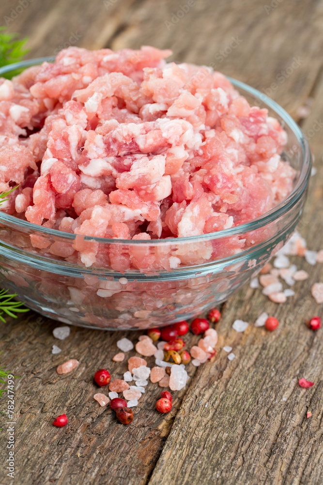 minced meat on wooden table minced meat on wooden table