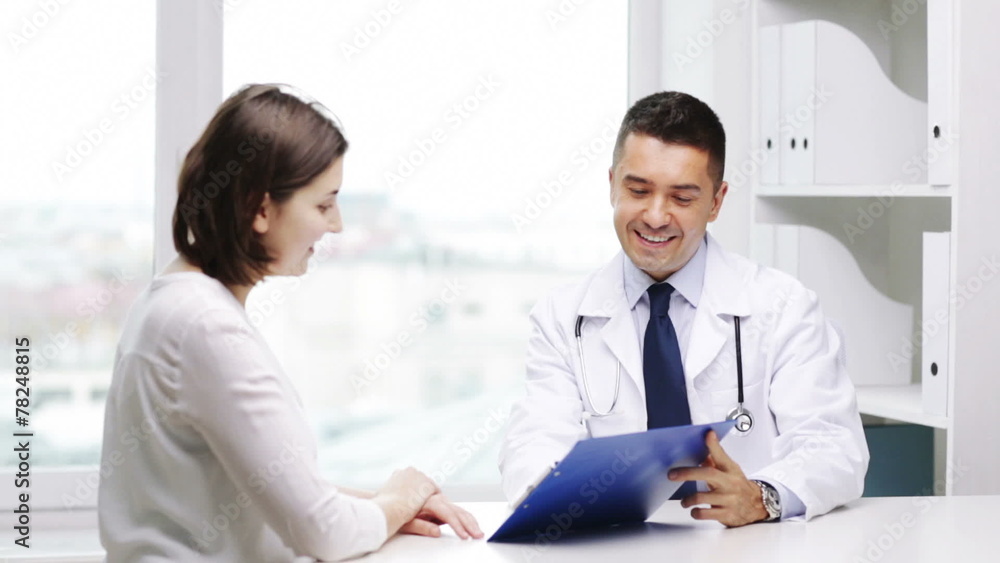 smiling doctor and young woman meeting at hospital smiling doctor and young woman meeting at hospital