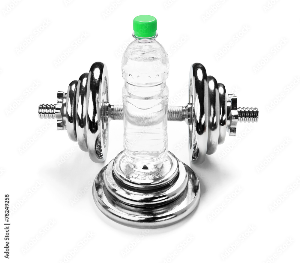 Dumbbell and a bottle of water, fitness concept Dumbbell and a bottle of water, fitness concept
