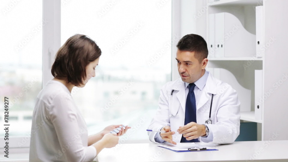 smiling doctor and young woman meeting at hospital smiling doctor and young woman meeting at hospital