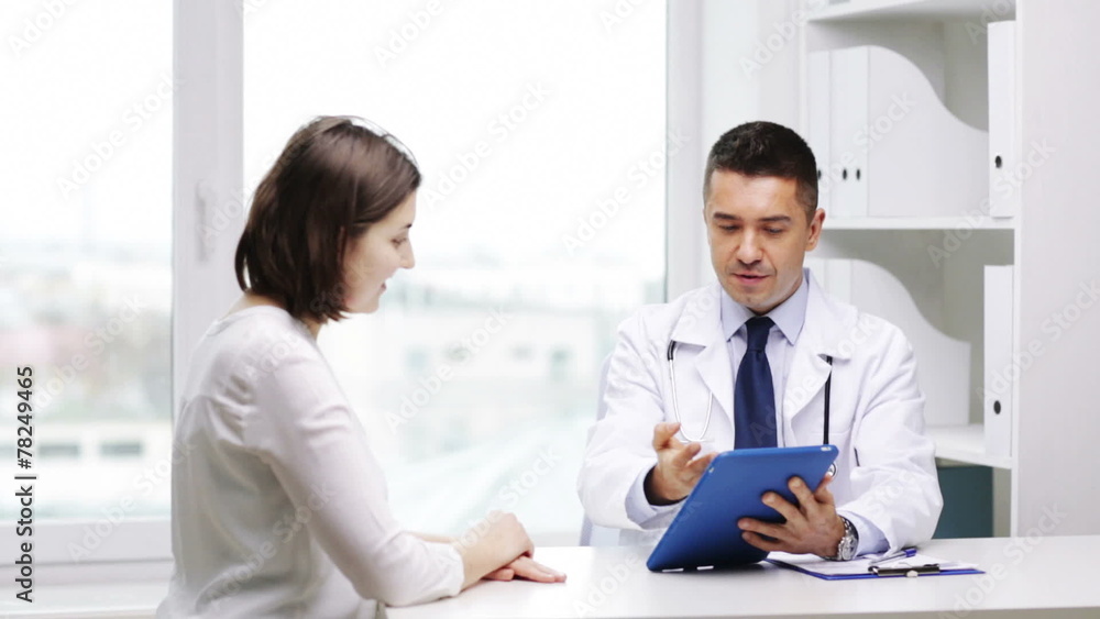 smiling doctor and young woman meeting at hospital smiling doctor and young woman meeting at hospital