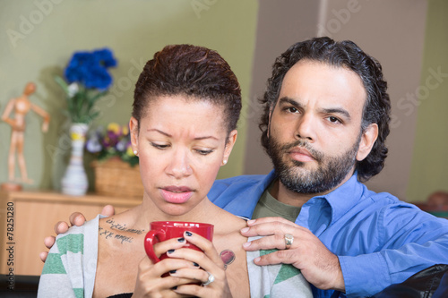 Vászonkép Worried Hispanic Couple