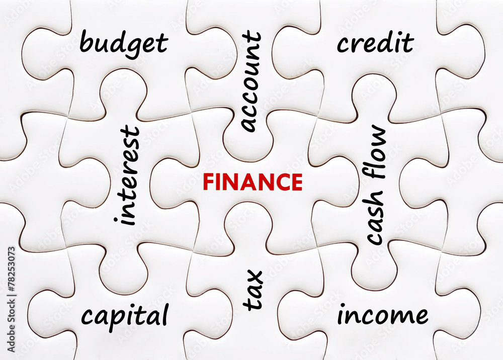 Related financial words on jigsaw puzzle background, financial c Related financial words on jigsaw puzzle background, financial c