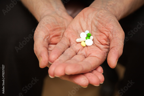palm with pills and vitamins