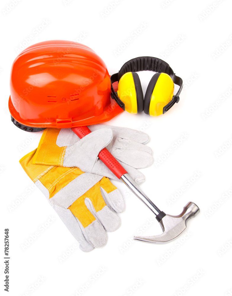 Red helmet and working tools. Red helmet and working tools.