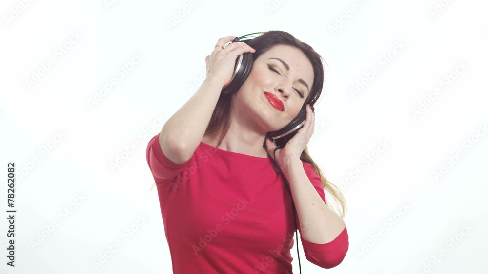 model in red swaying music headphones in slow motion white model in red swaying music headphones in slow motion white