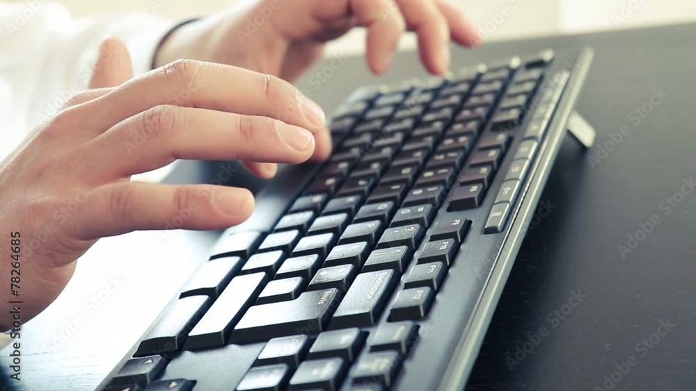 business man typing on a pc keyboard, technology concept business man typing on a pc keyboard, technology concept