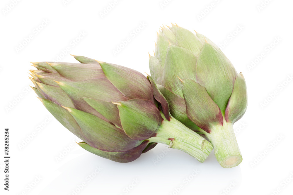 Fototapeta premium Green artichokes on white, clipping path