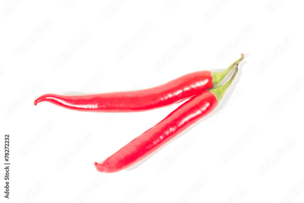 couple peppers chli lie on a white background
