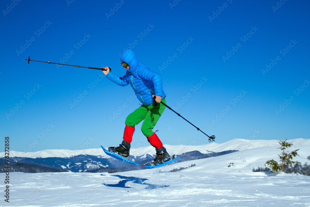 Winter hiking in snowshoes.