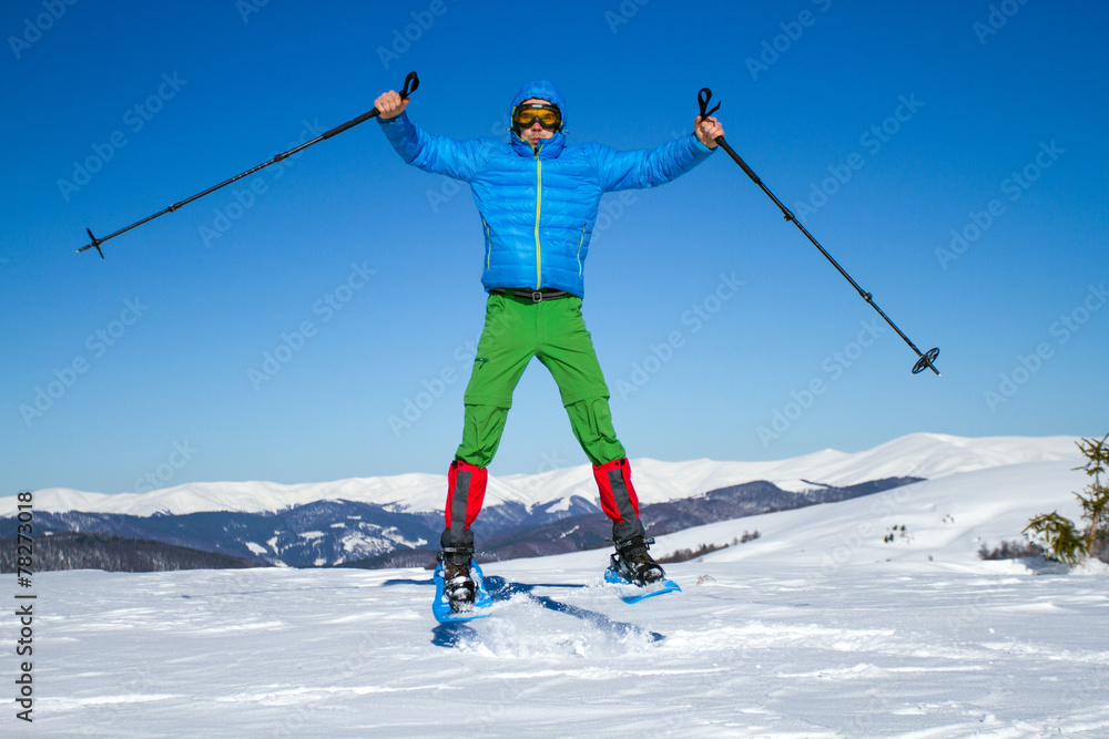 Winter hiking in snowshoes.