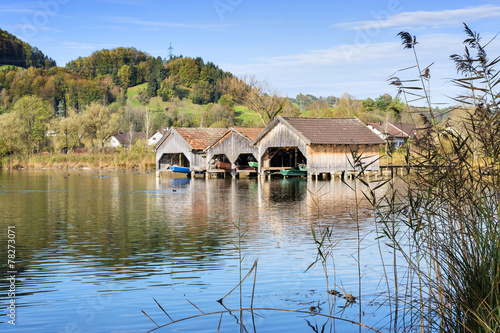 boathouses and reed at lake Kochelsee