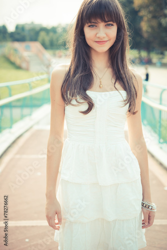 beautiful young woman with white dress