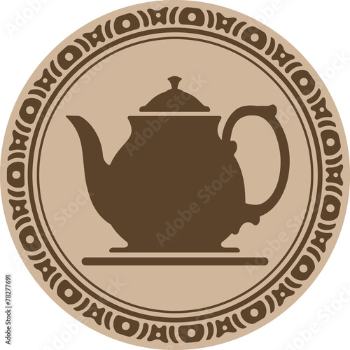 Teapot into decorative round frame