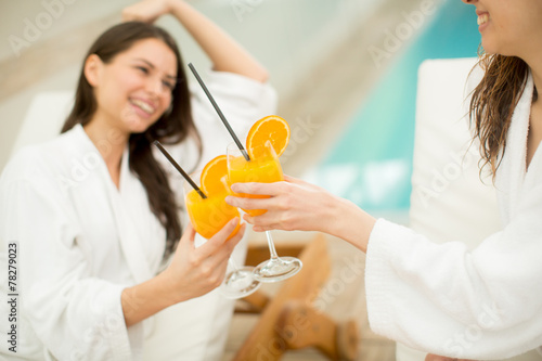 Young women relaxing by the...