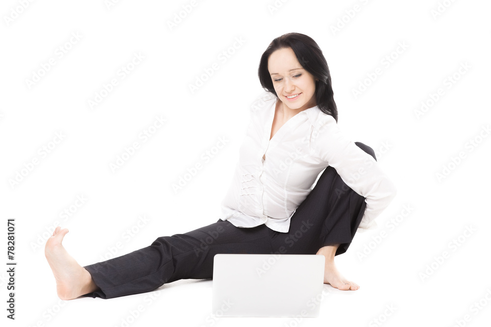 Young office woman with laptop exercising on white background Young office woman with laptop exercising on white background