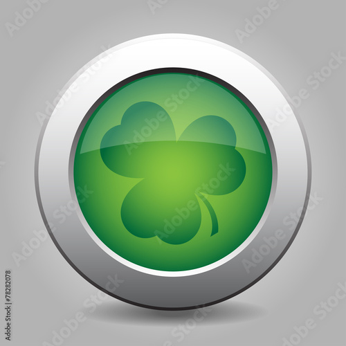 metal button with the dark green shamrock