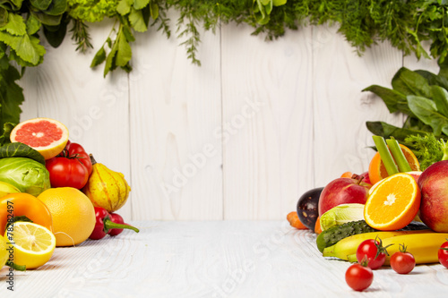 Fototapeta Naklejka Na Ścianę i Meble -  Fruit and vegetable borders on wood table