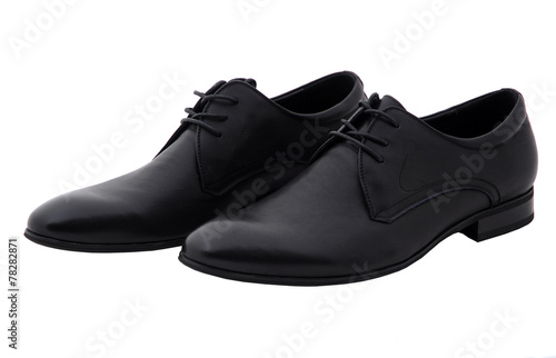 Black patent leather men shoes against white background. Male