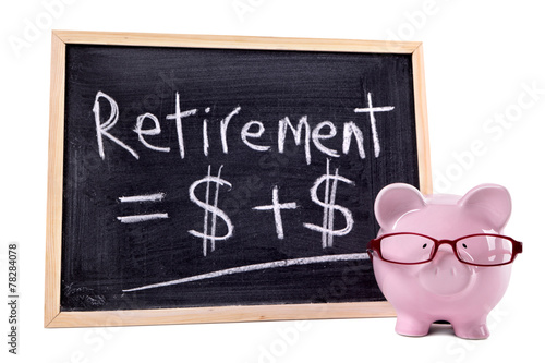 Piggy Bank or piggybank with retirement pension savings growth formula calculation drawn on small blackboard isolated on white background photo