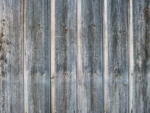 Old rough discolored wooden texture