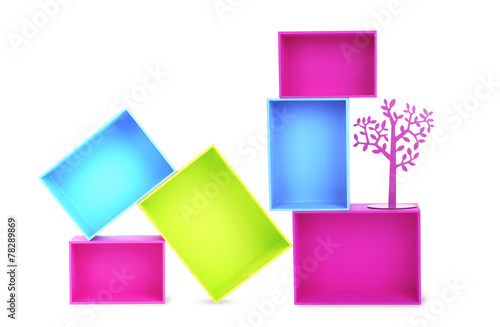 Multicoloured wooden boxes and decorative metal tree isolated