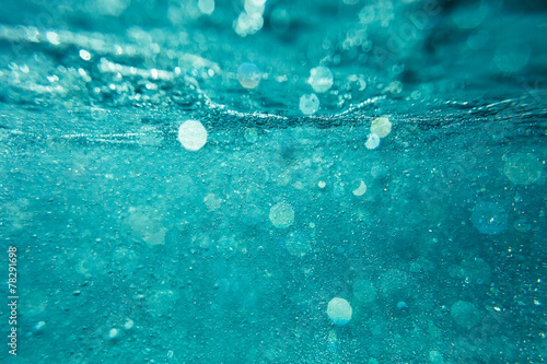 abstract underwater background with bokeh photo