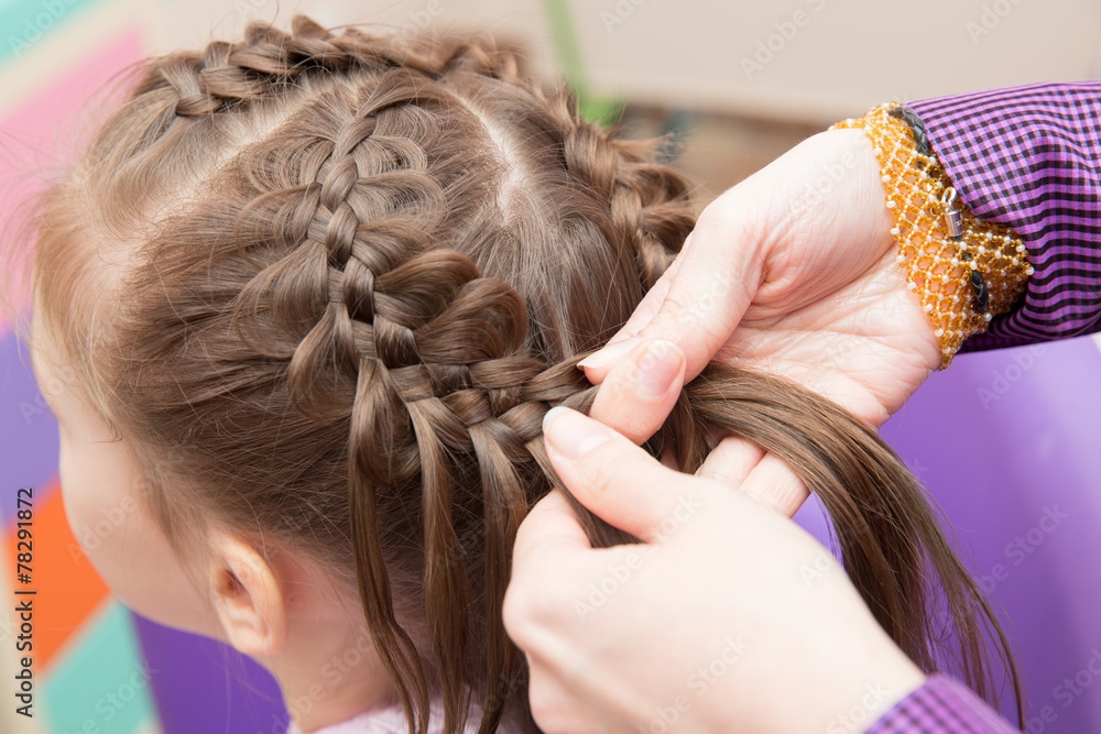 Fototapeta premium braid hairstyle whimsical child