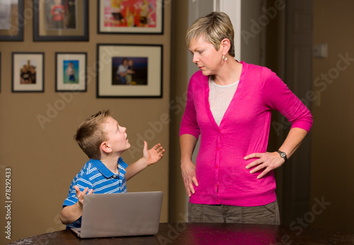 Mother upset at son for gaming on computer.