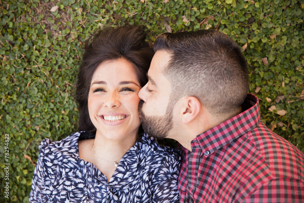 Fototapeta premium Kissing my girl in the cheek