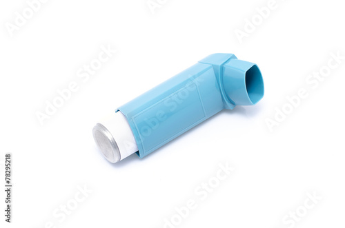 Asthma inhaler isolated on a white background