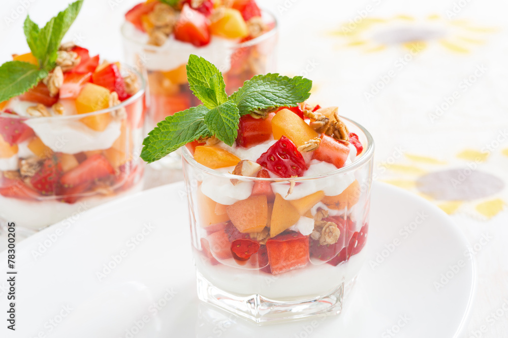 dessert with strawberries, apricots, whipped cream and mint dessert with strawberries, apricots, whipped cream and mint