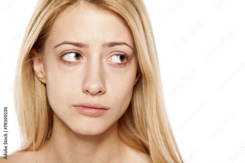 portrait of concerned young blonde without make up portrait of concerned young blonde without make up