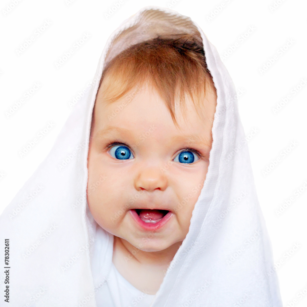 Surprised baby under the white towel Surprised baby under the white towel