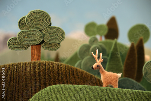 Deer in the wood (also available as footage)